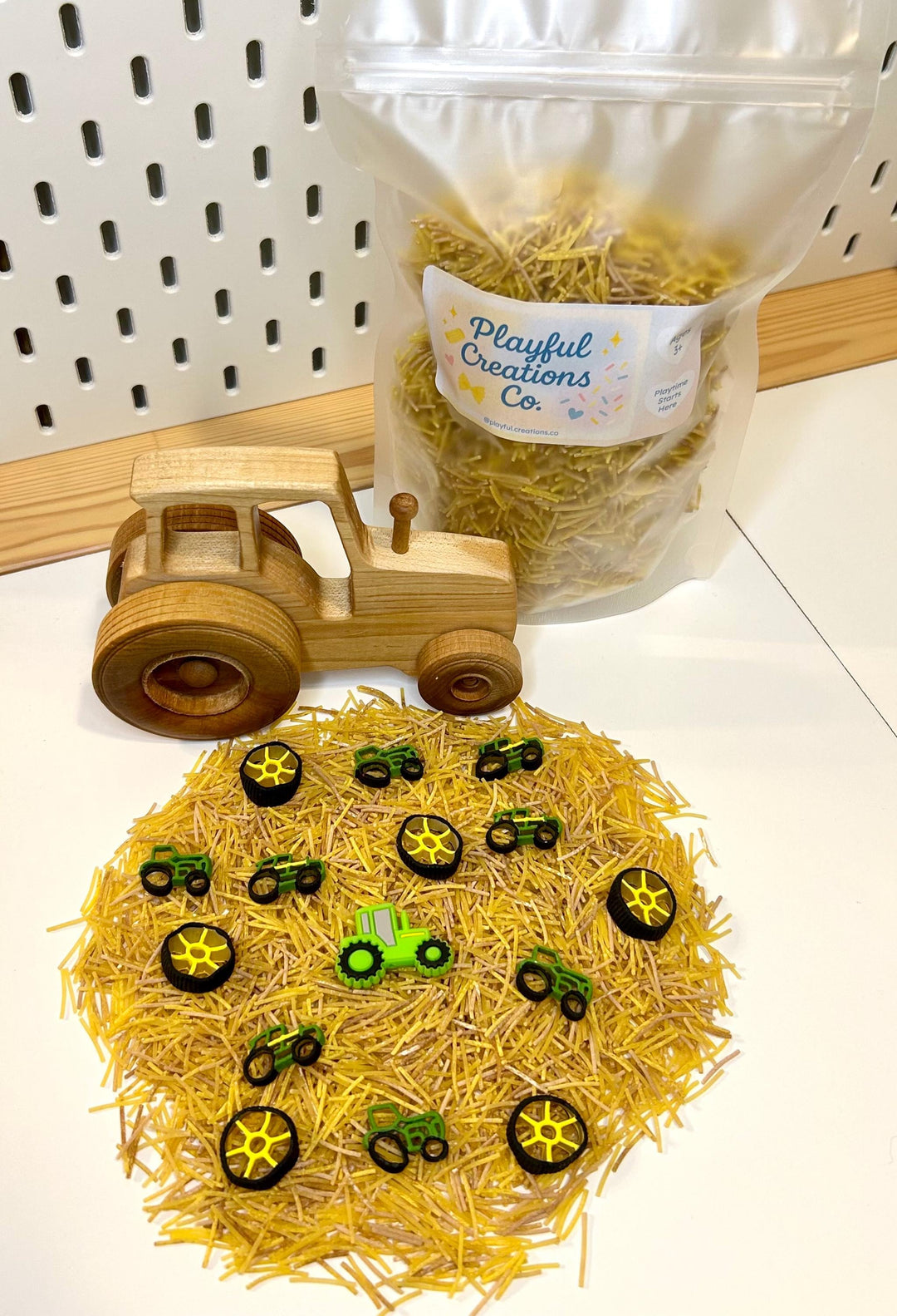 Farm Tractor Sensory Filler | Hay Pasta Sensory Bin Mix | Tractor Wheel Pasta | Montessori Farm Sensory Play | Playful Creations Co.