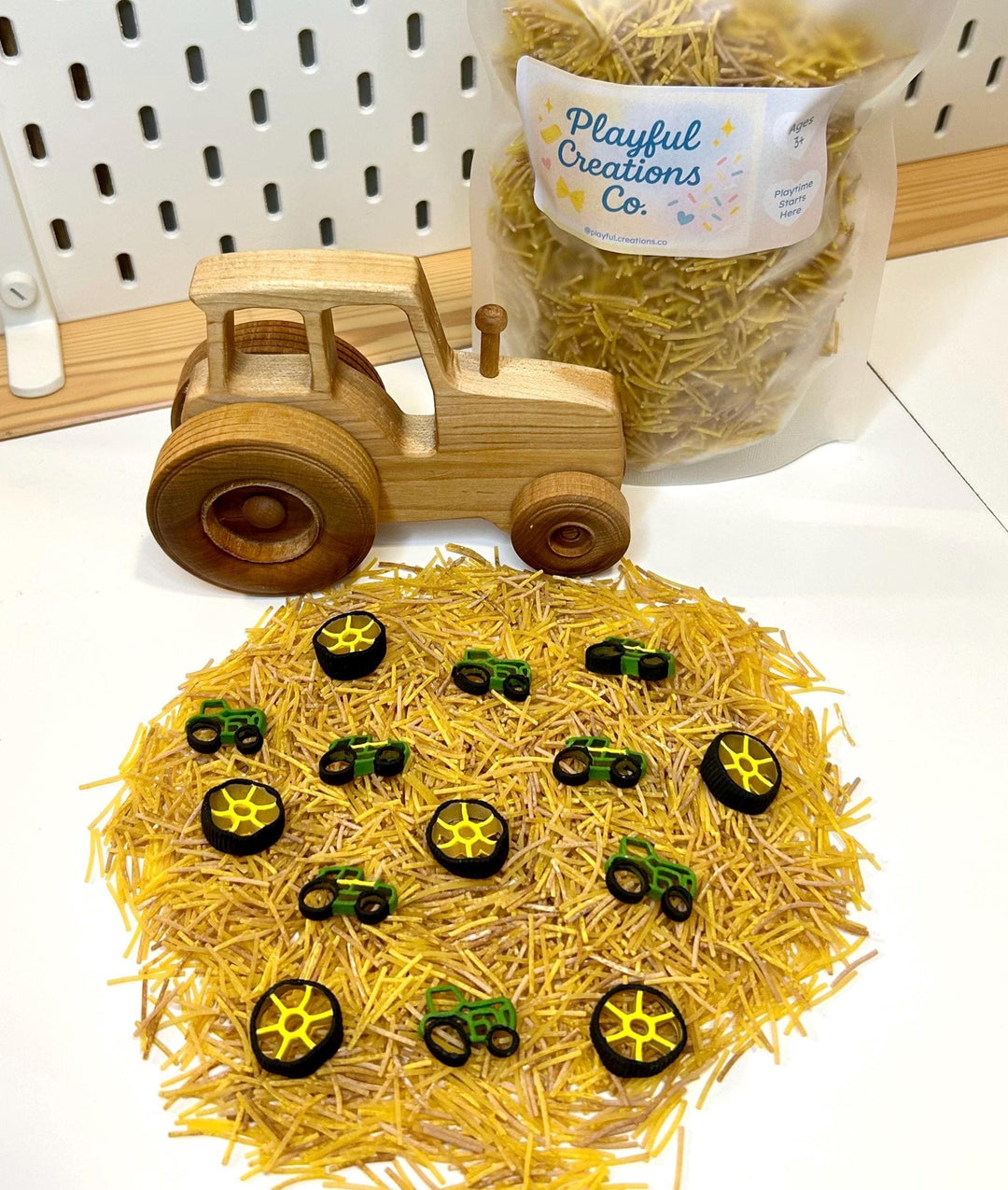 Farm Tractor Sensory Filler | Hay Pasta Sensory Bin Mix | Tractor Wheel Pasta | Montessori Farm Sensory Play | Playful Creations Co.