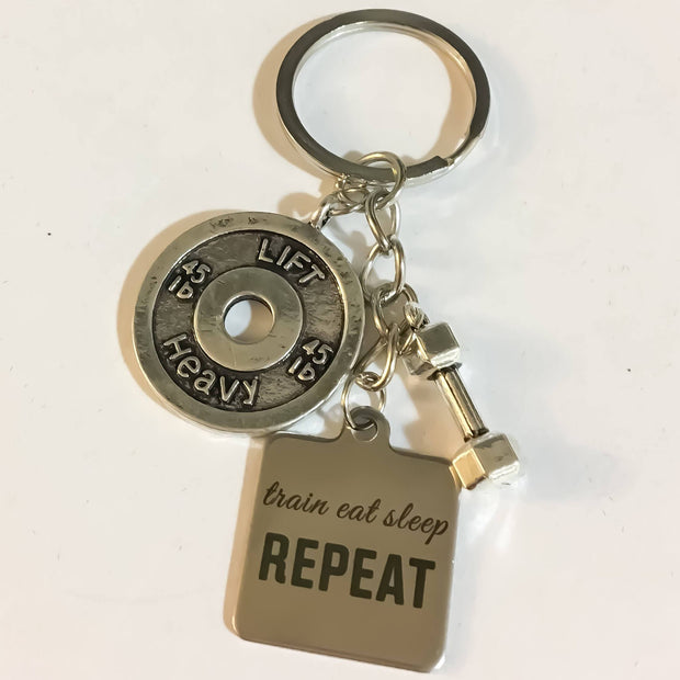 https://missfitboutique.com/cdn/shop/products/train-eat-sleep-repeat-fitness-keychain-crossfit-gifts-lift-heavy-dumbbell-charm-fitness-charms-fitness-gifts-gift-ideas-motivation-2_620x.jpg?v=1571709666